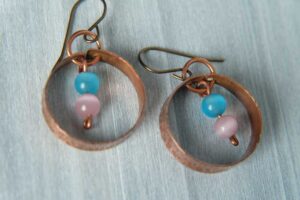 Copper Floating circle earrings.